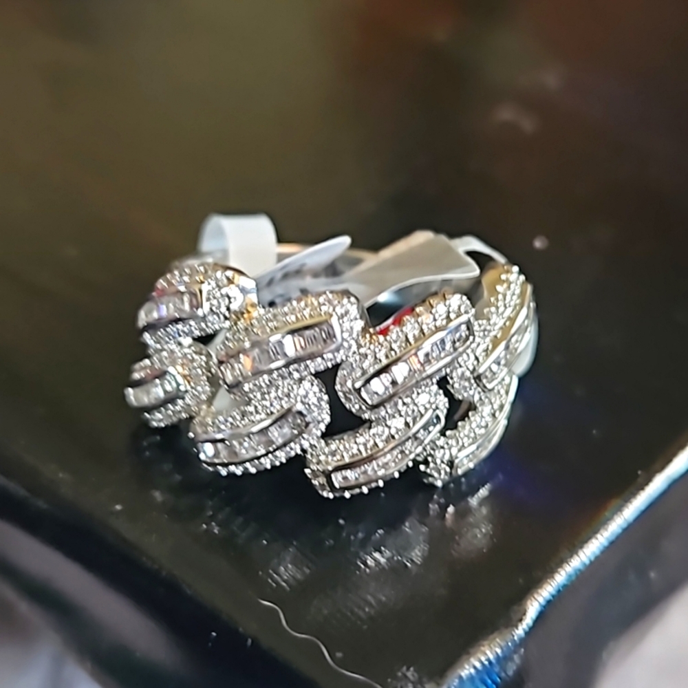 Iced out baguette cut.